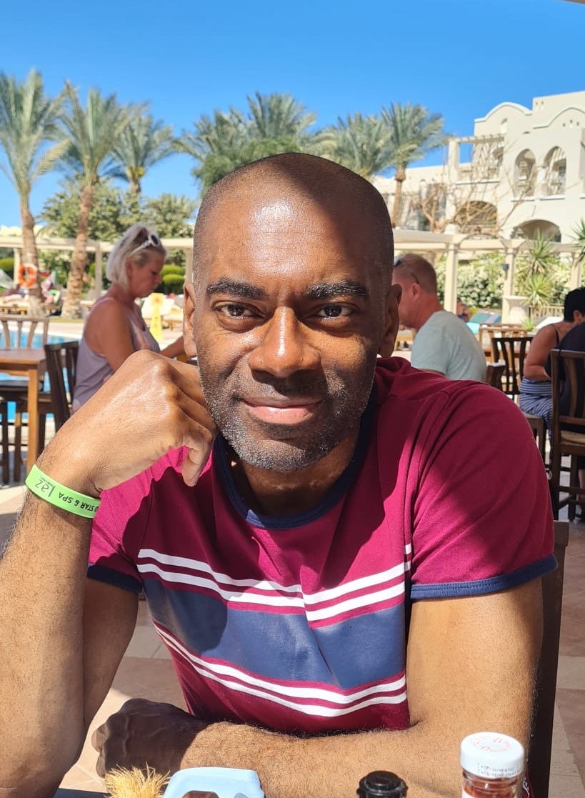 Cecil smiling in sun on holidays