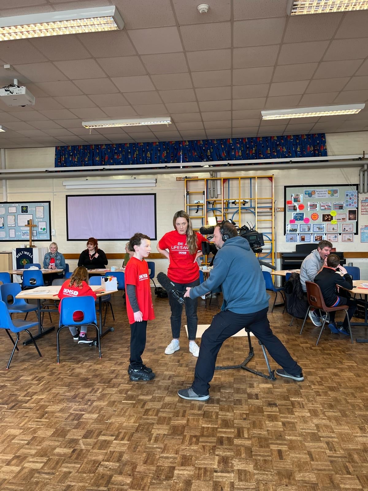 Terry Brownbill's grandson and daughter speaking to a reporter 
