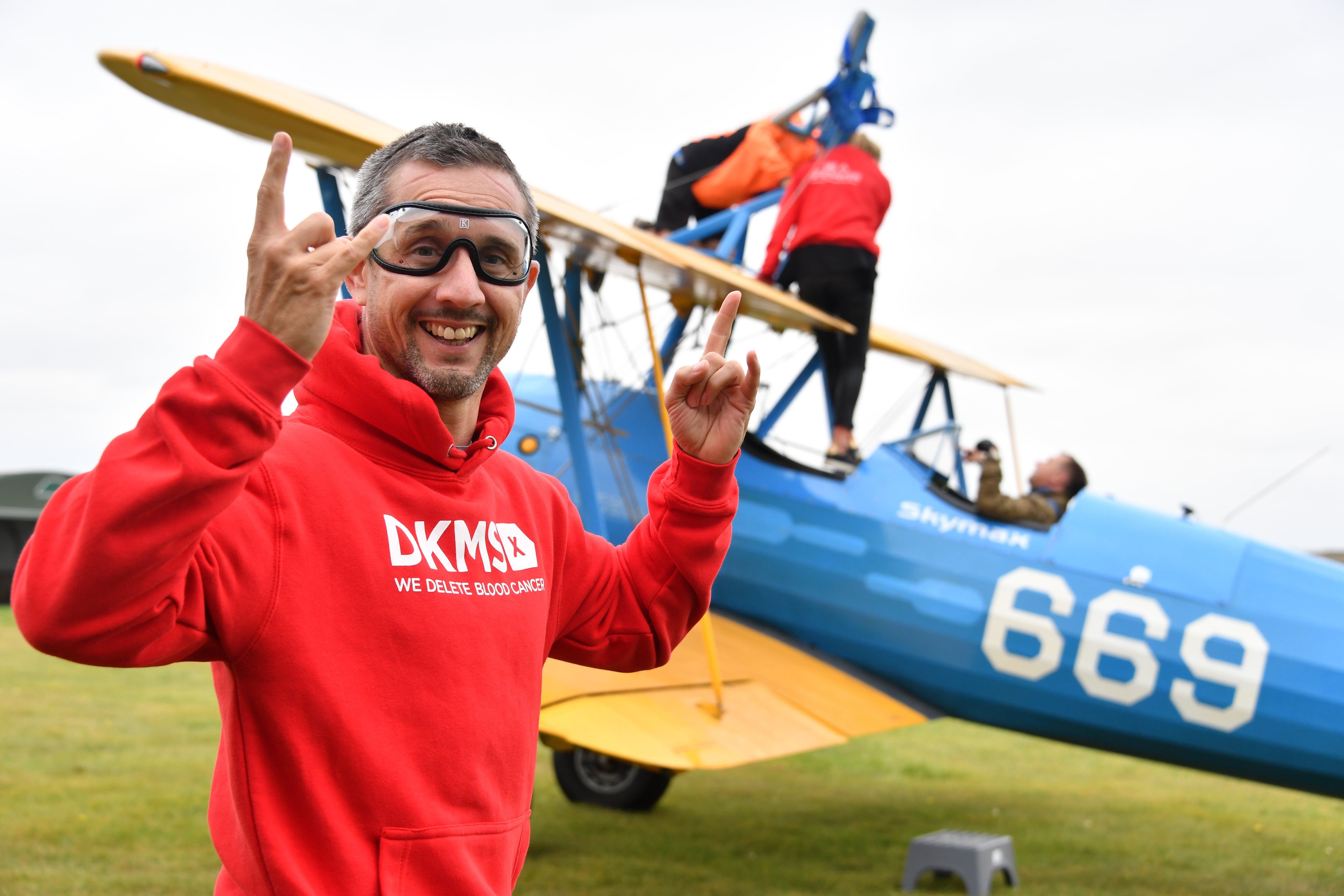 Pete ready to climb onto the plane