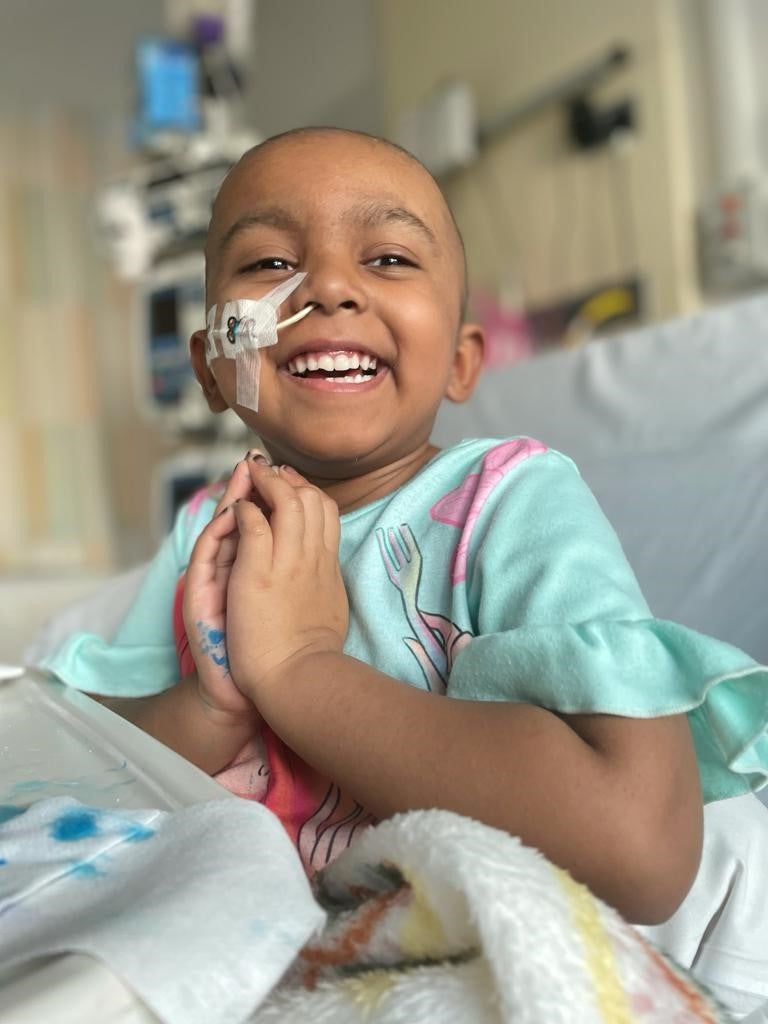 Esha smiling at camera