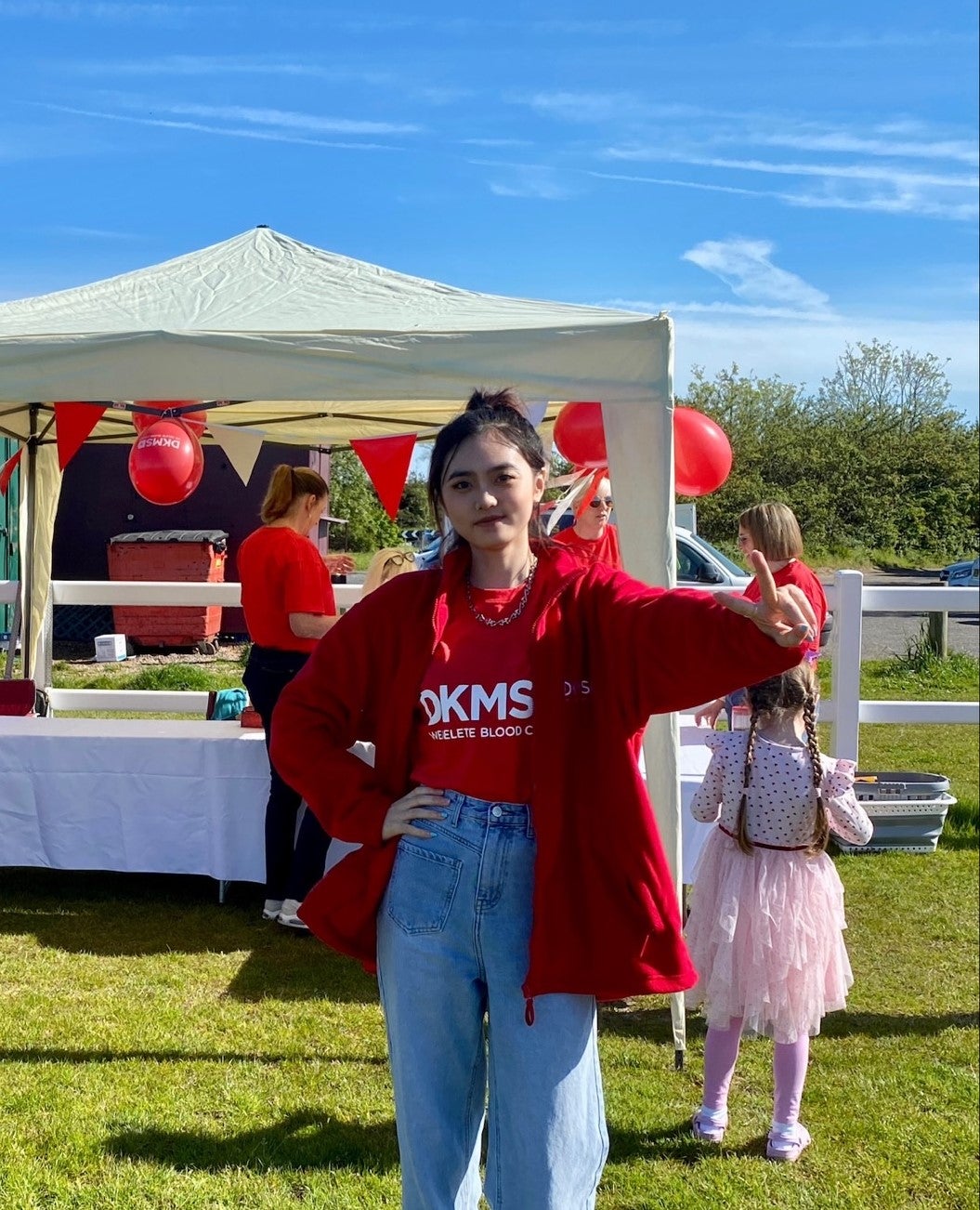 DKMS volunteer at an event
