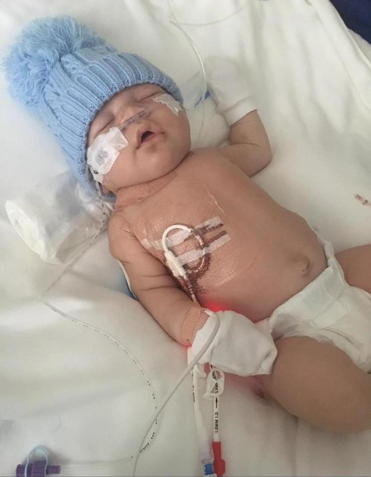 Ryan Brissett in hospital shortly after mum noticed heavy breathing and abnormal spots