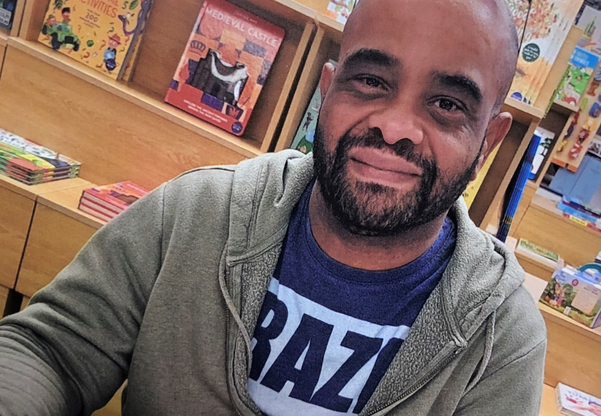 John O'Connor wearing a grey hoodie