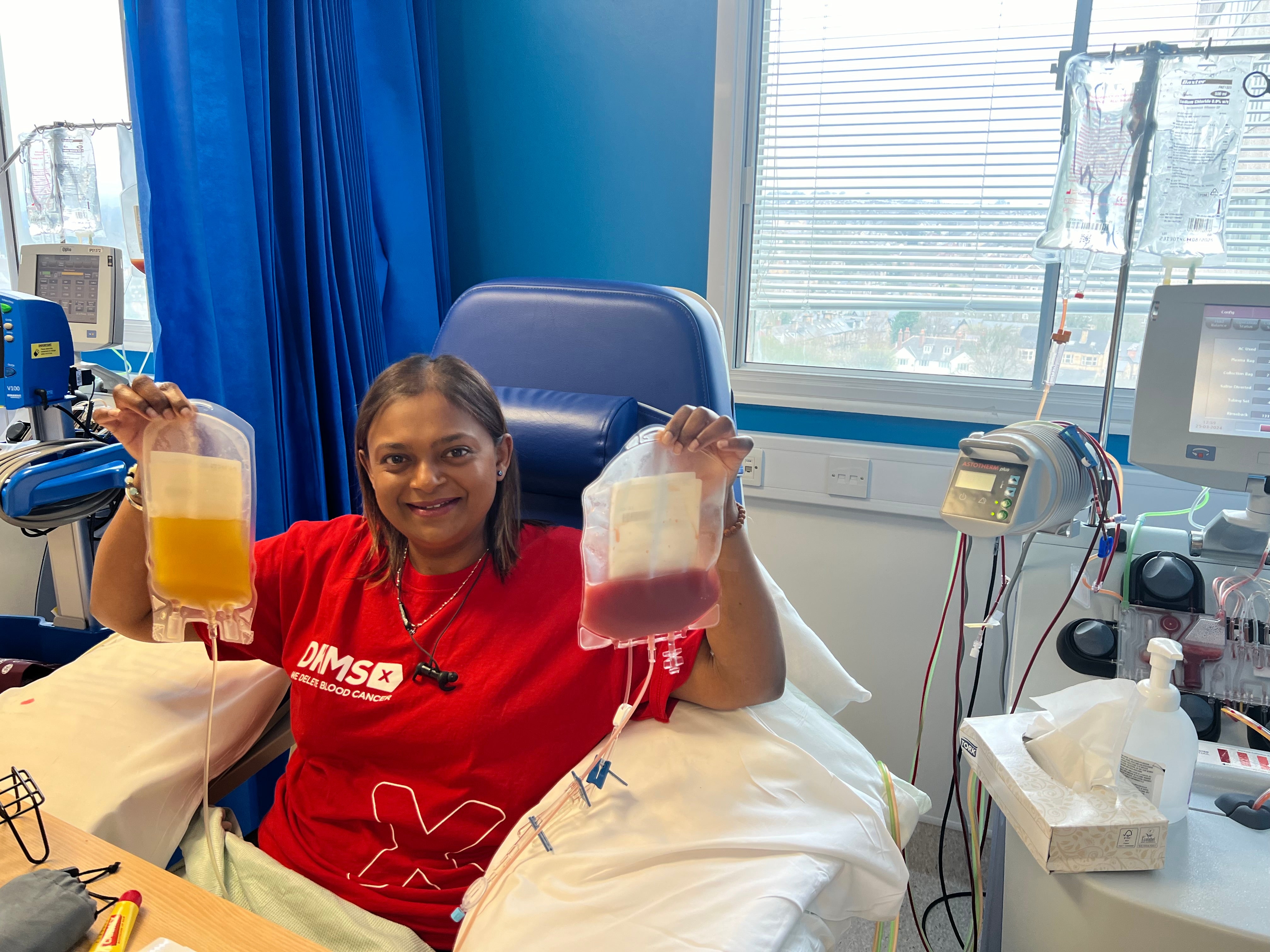 Image of Kam holding her stem cells