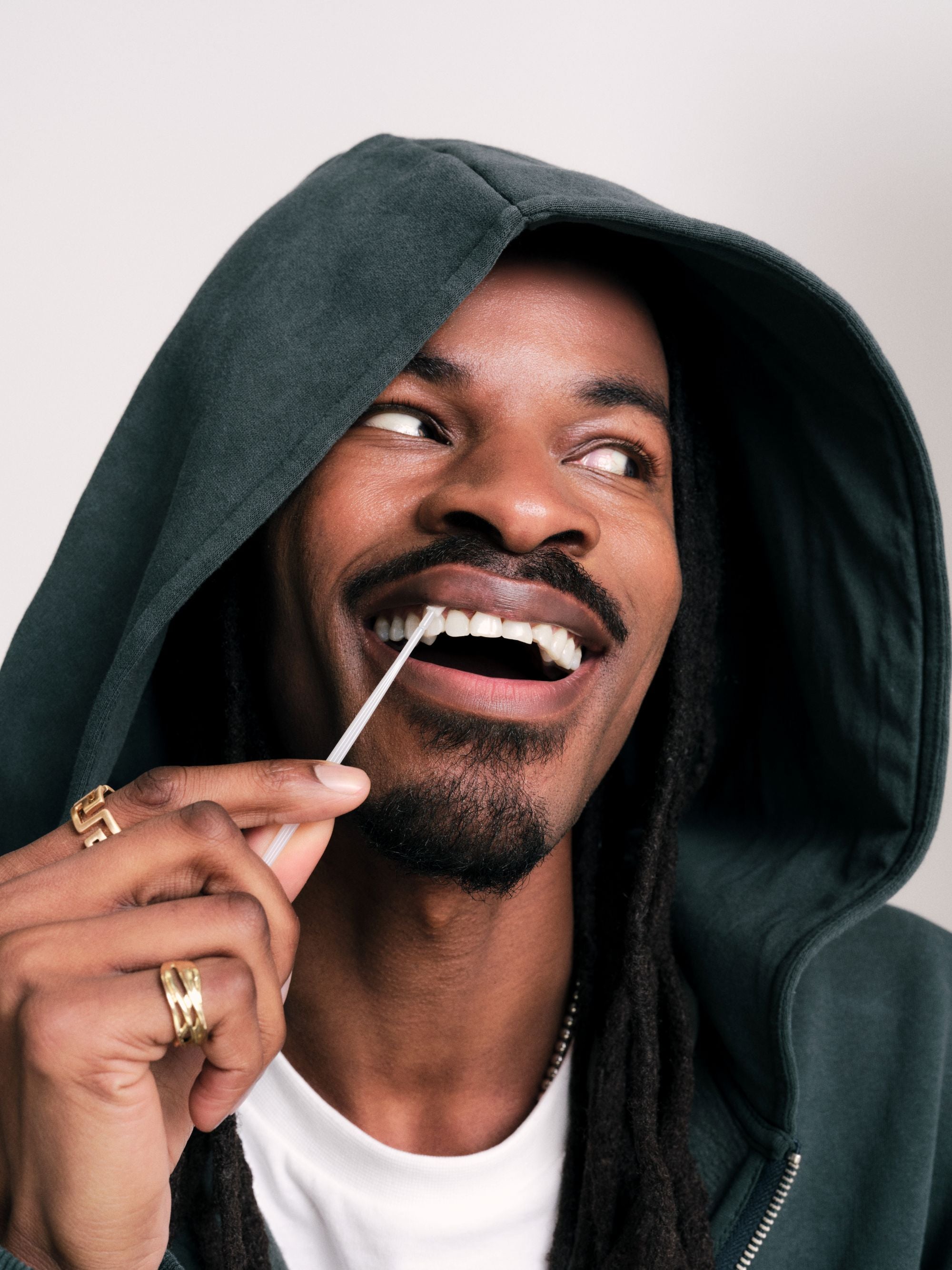 Model Michael swabbing for the DKMS "Do The Swab" campaign