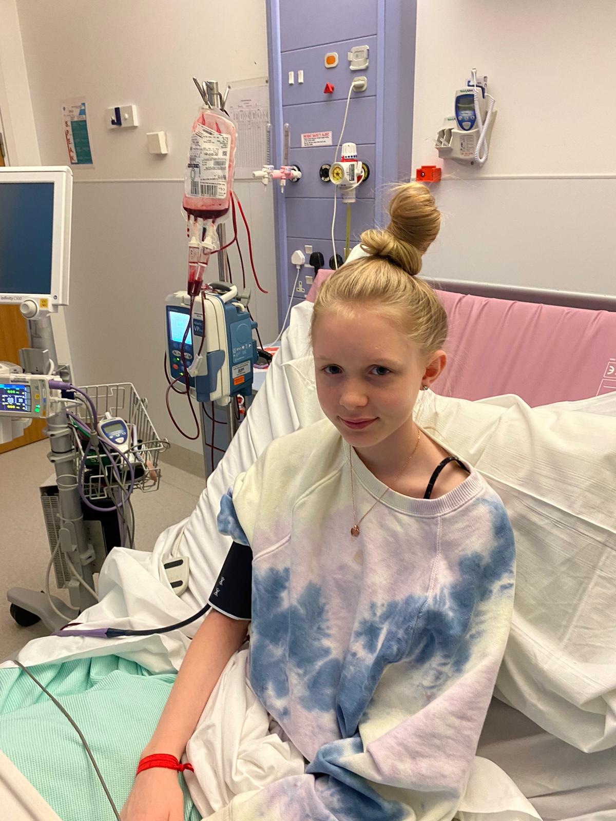 Libby in a hospital bed