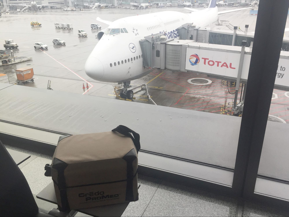 DKMS courier awaits her flight to the US