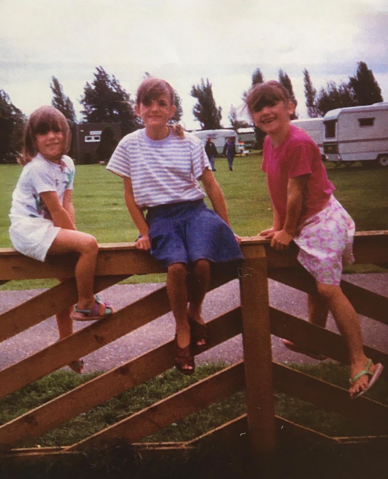 Image of Alice with her sisters when they were younger 