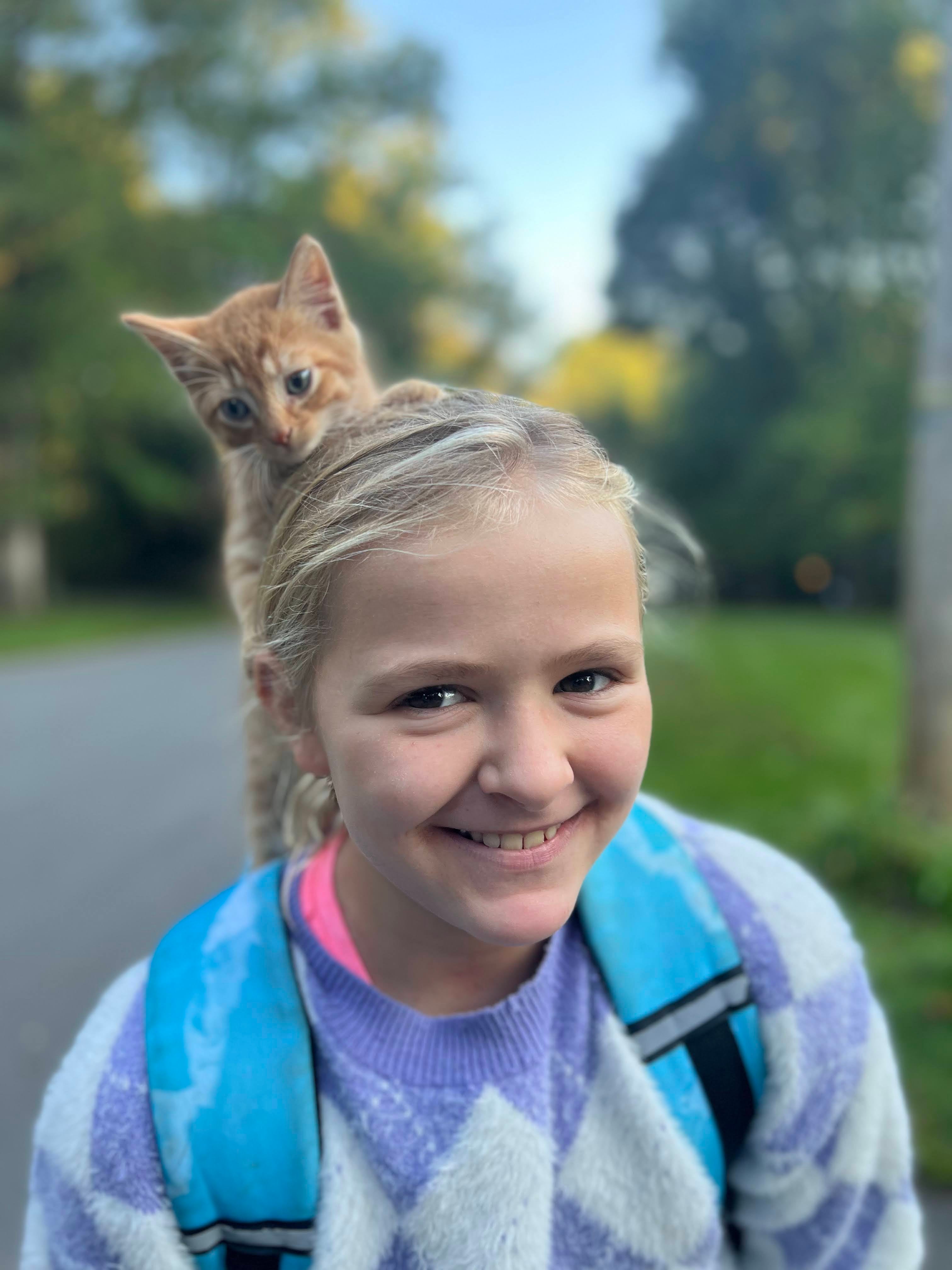 image of Lani with a cat