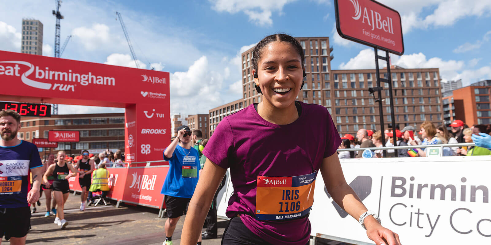 Smiling runner just crossed the finish line at the Great Birmingham Run