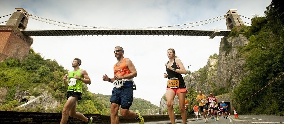 Runners with Clifton Suspension Bridge in the background