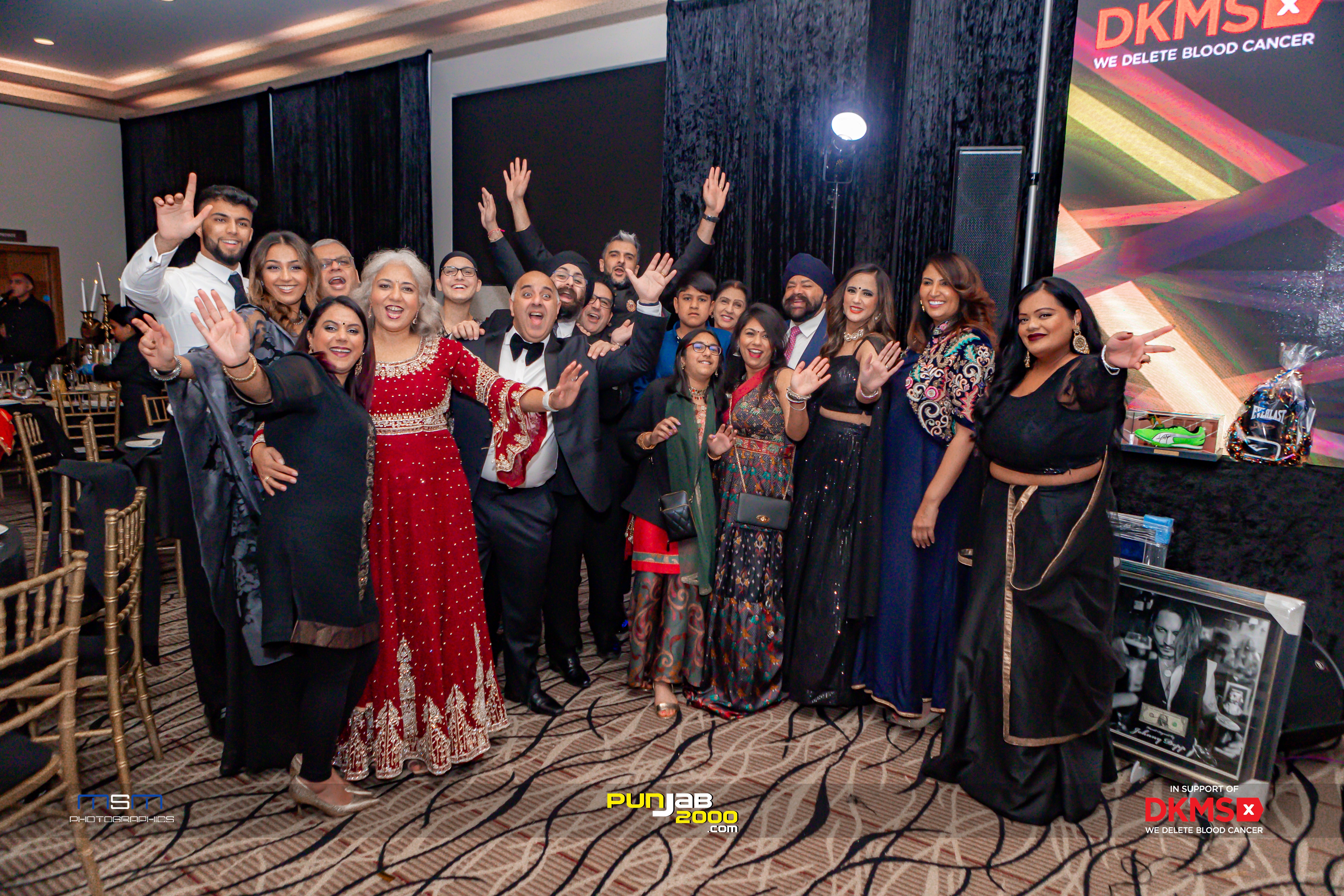 Group of guests celebrating at the event