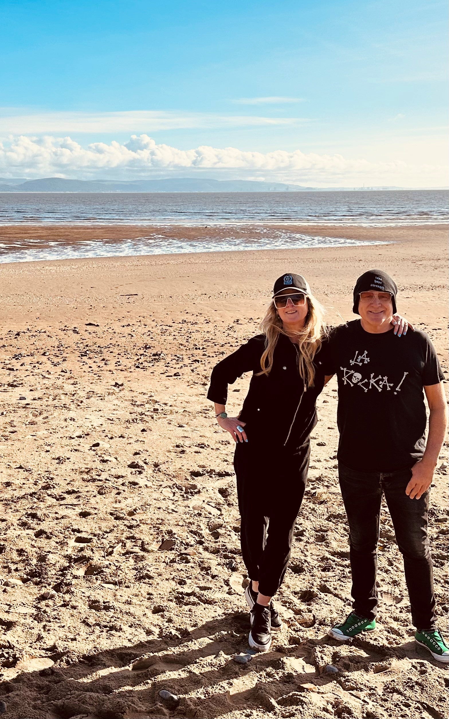 A middle age man and woman at the beach