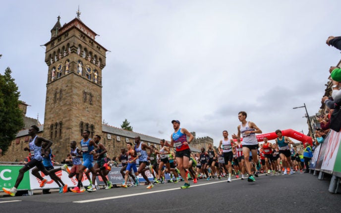 Runners going past Cardiff Castle