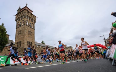 Runners going past Cardiff Castle