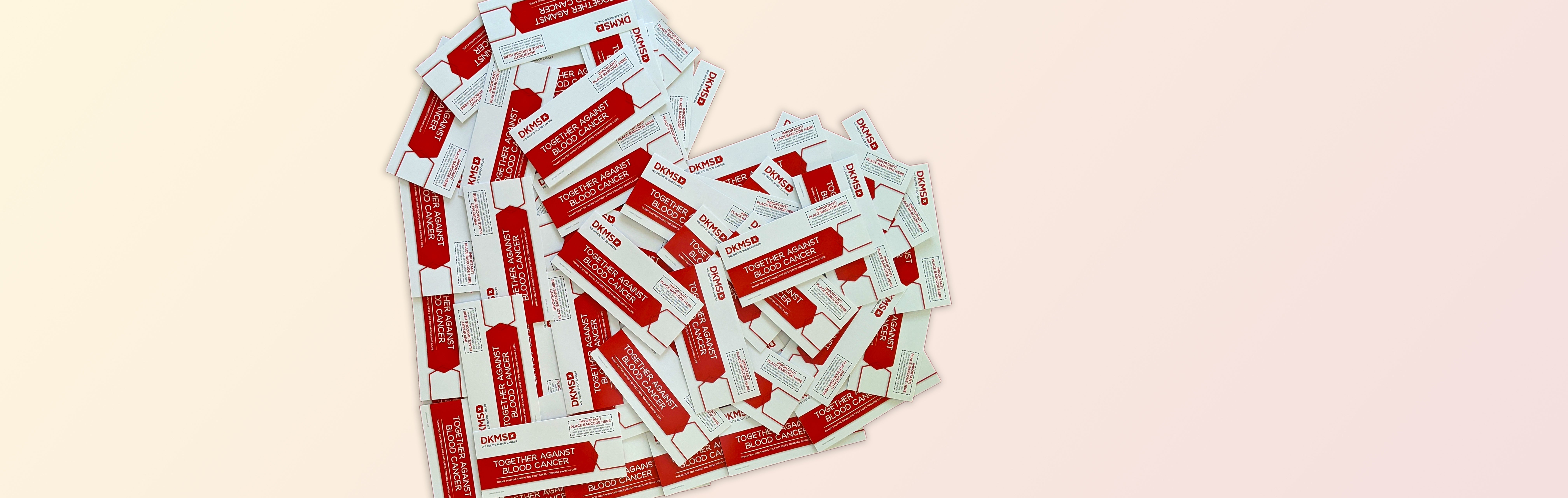 DKMS swab packs arranged in a heart shape