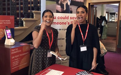 Meera and Jaina doing mouth swabs