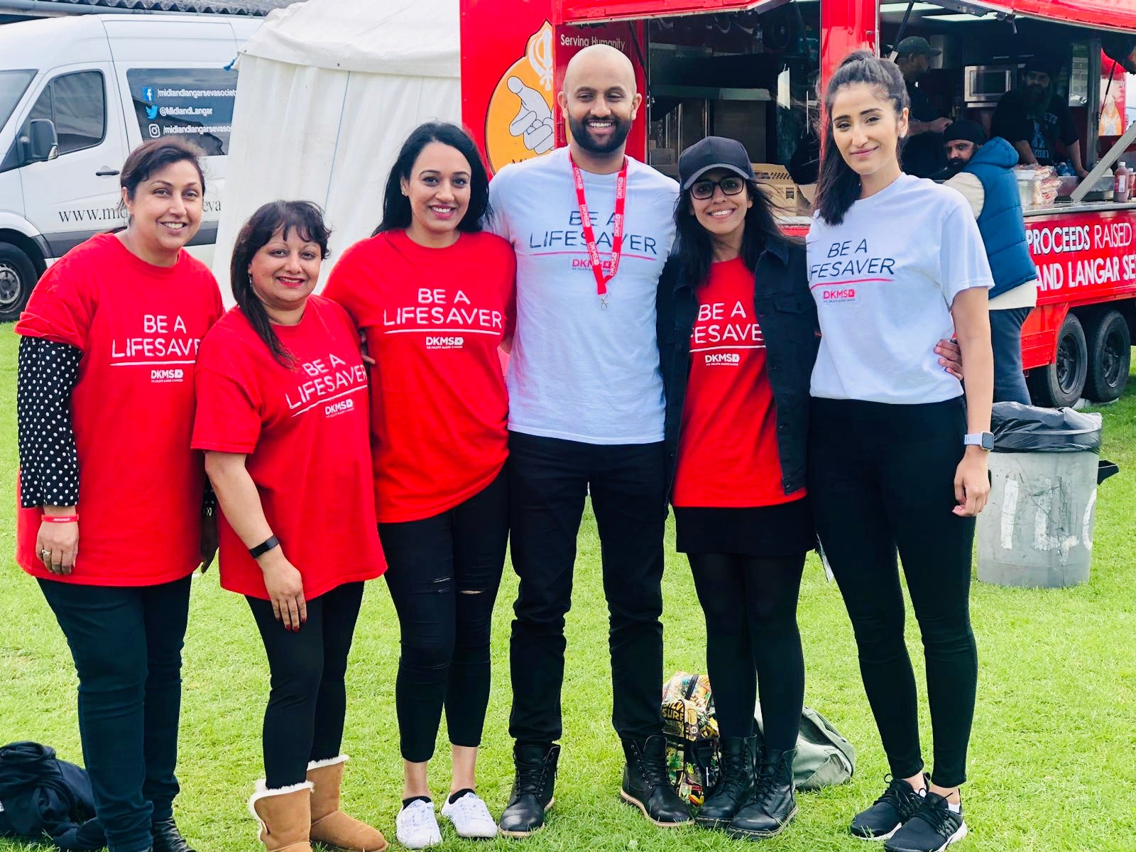 DKMS volunteers wearing branded t-shirts