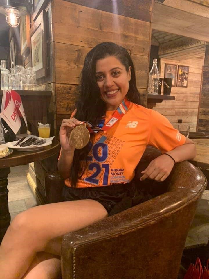 Priya Davdra wearing London Marathon medal