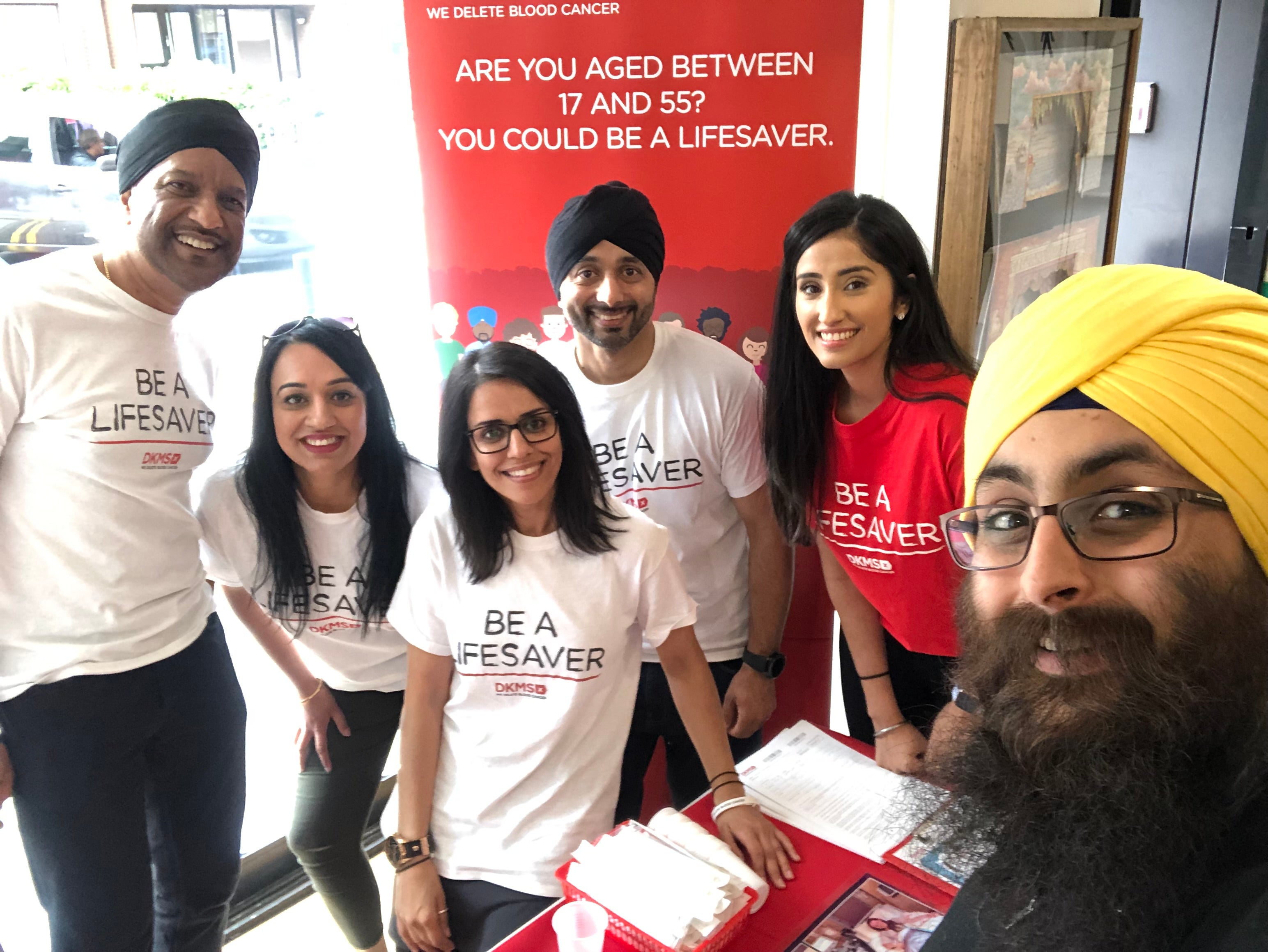 DKMS Volunteers wearing branded t-shirts