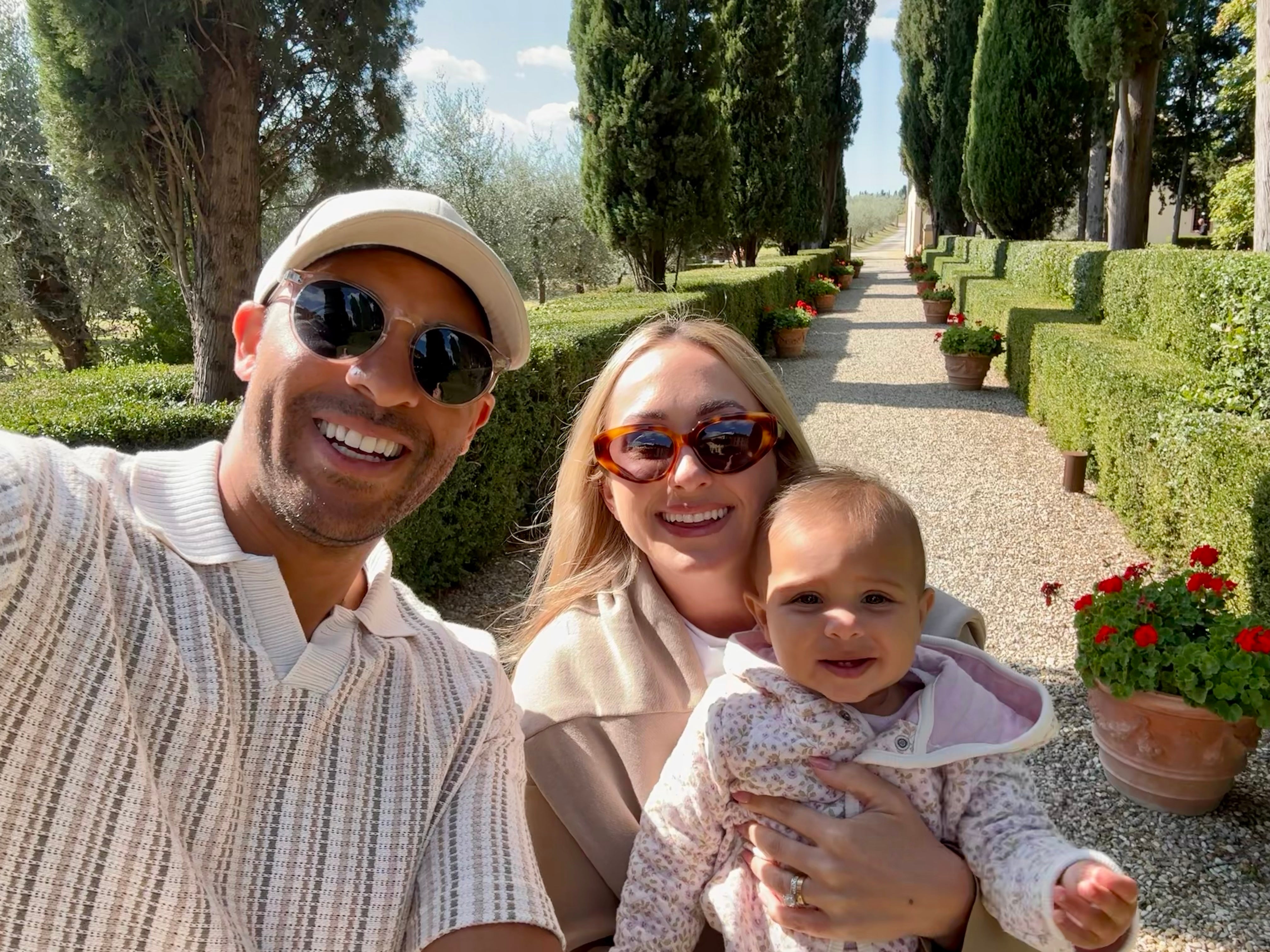Chris Gordon, patient, smiling with his wife and daughter