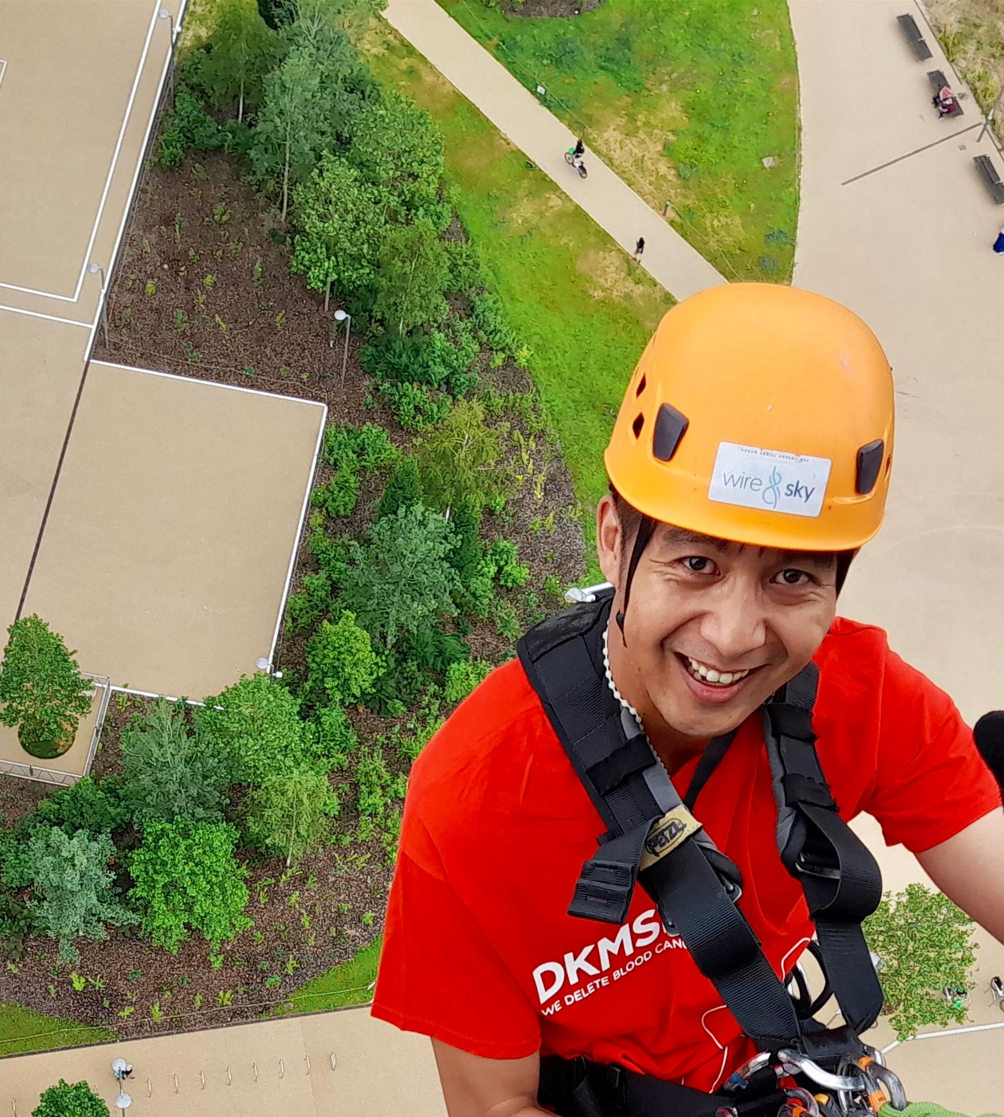Ian Corpuz leading a fundraising abseiling event at the Olympic Park