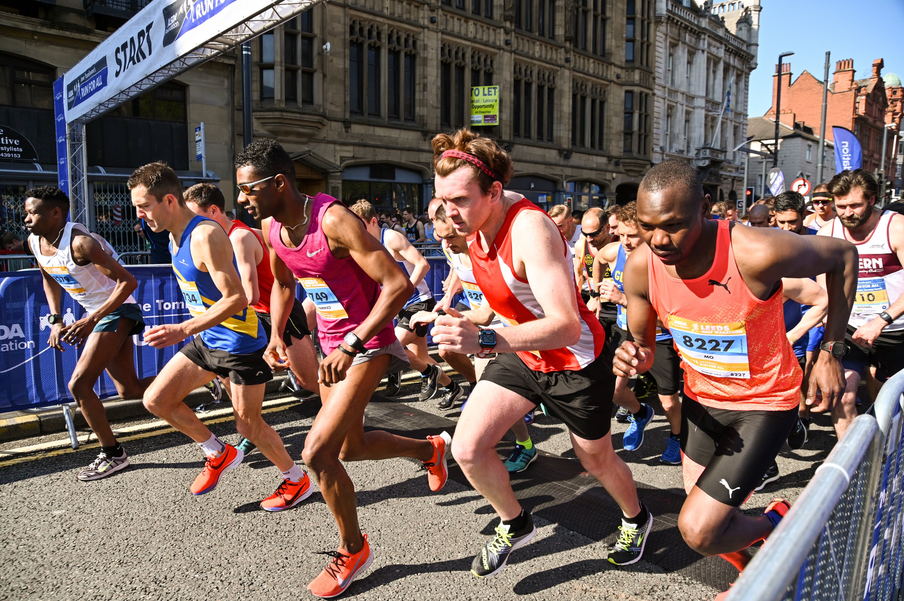 Runners moving from the start line at the Leeds Marathon