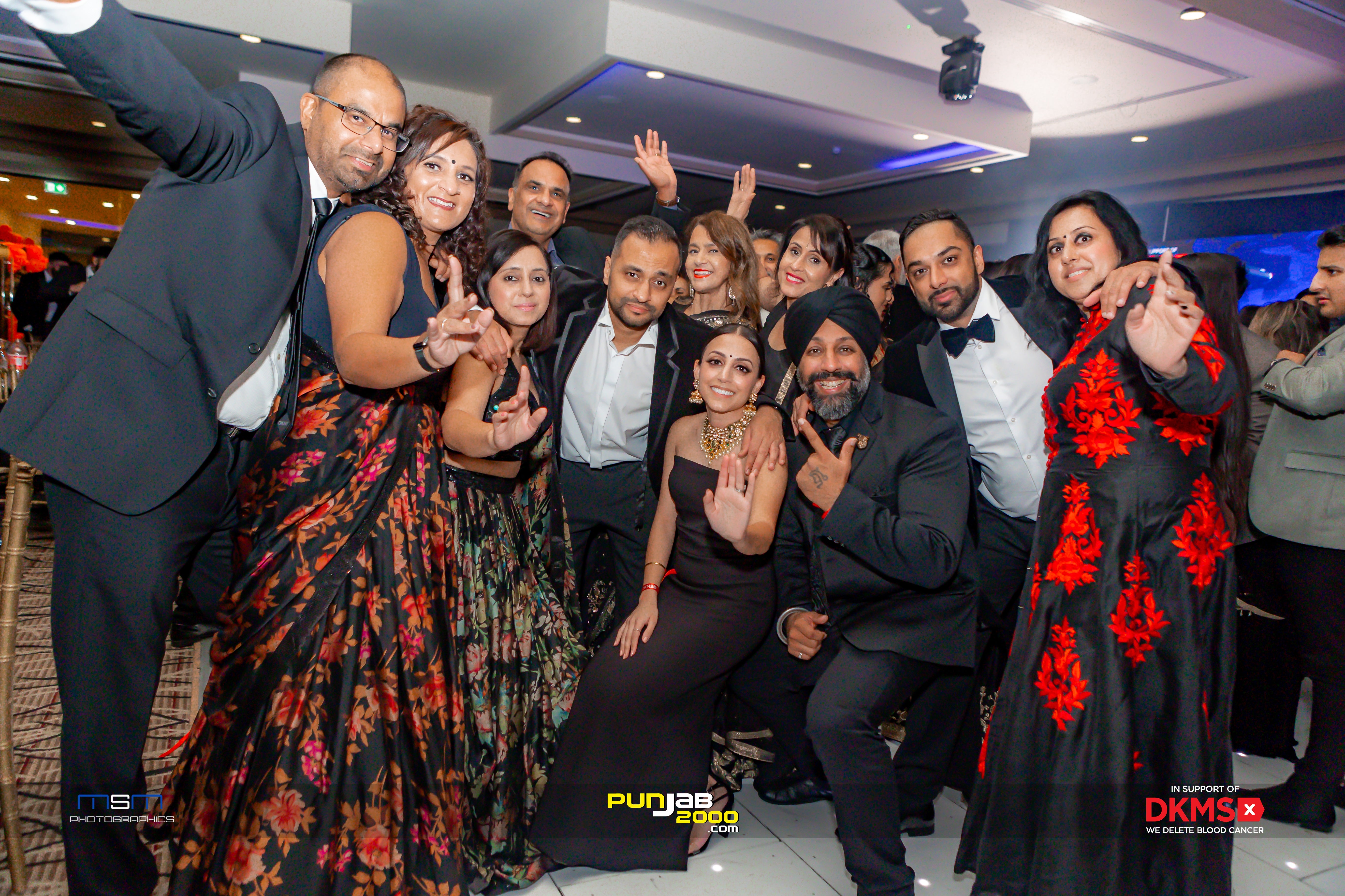 Members of West Midlands volunteering hub and guests in evening dress