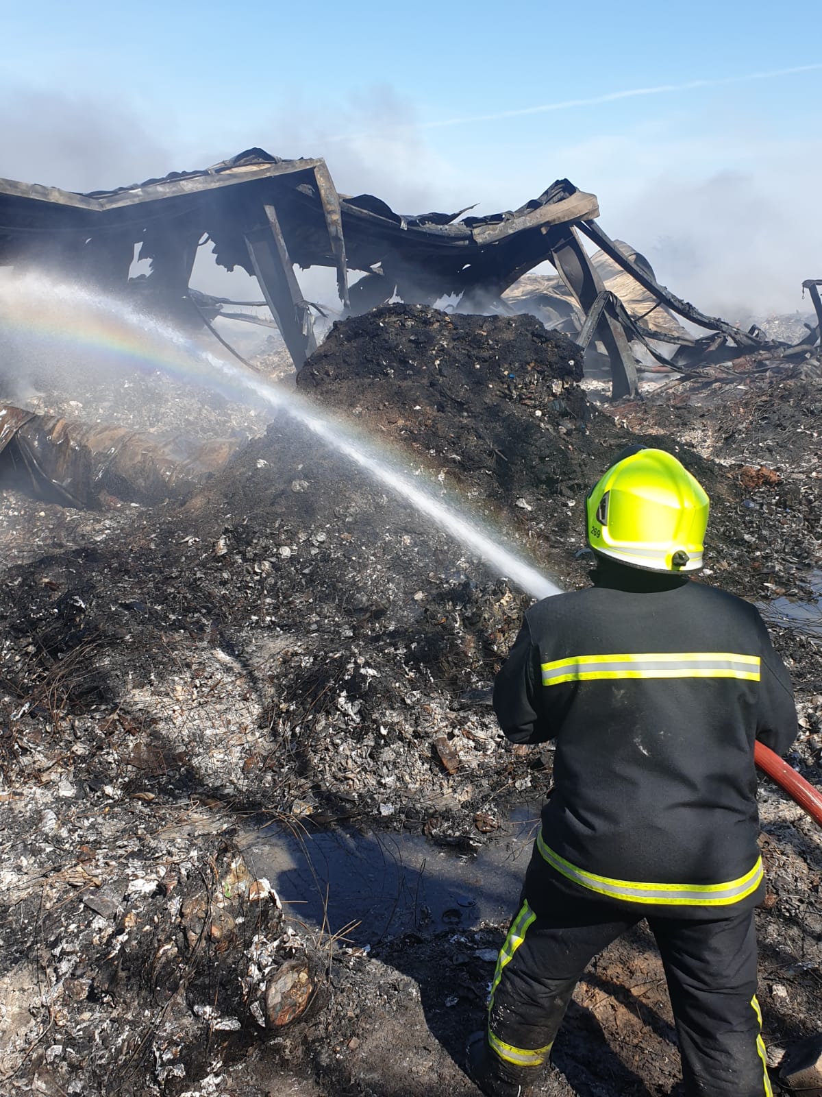 Firefighter putting out a fire