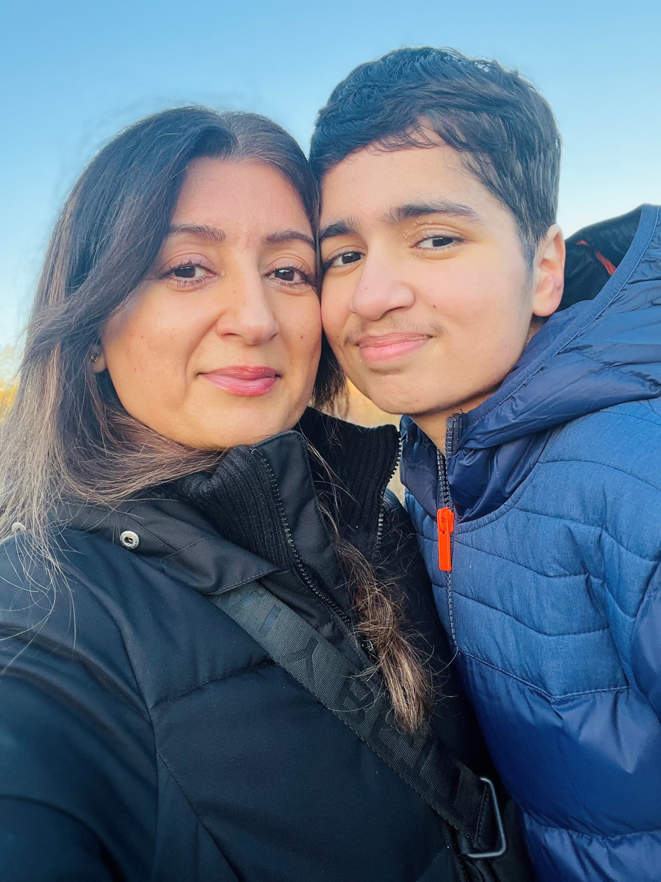 A selfie of a woman and her son