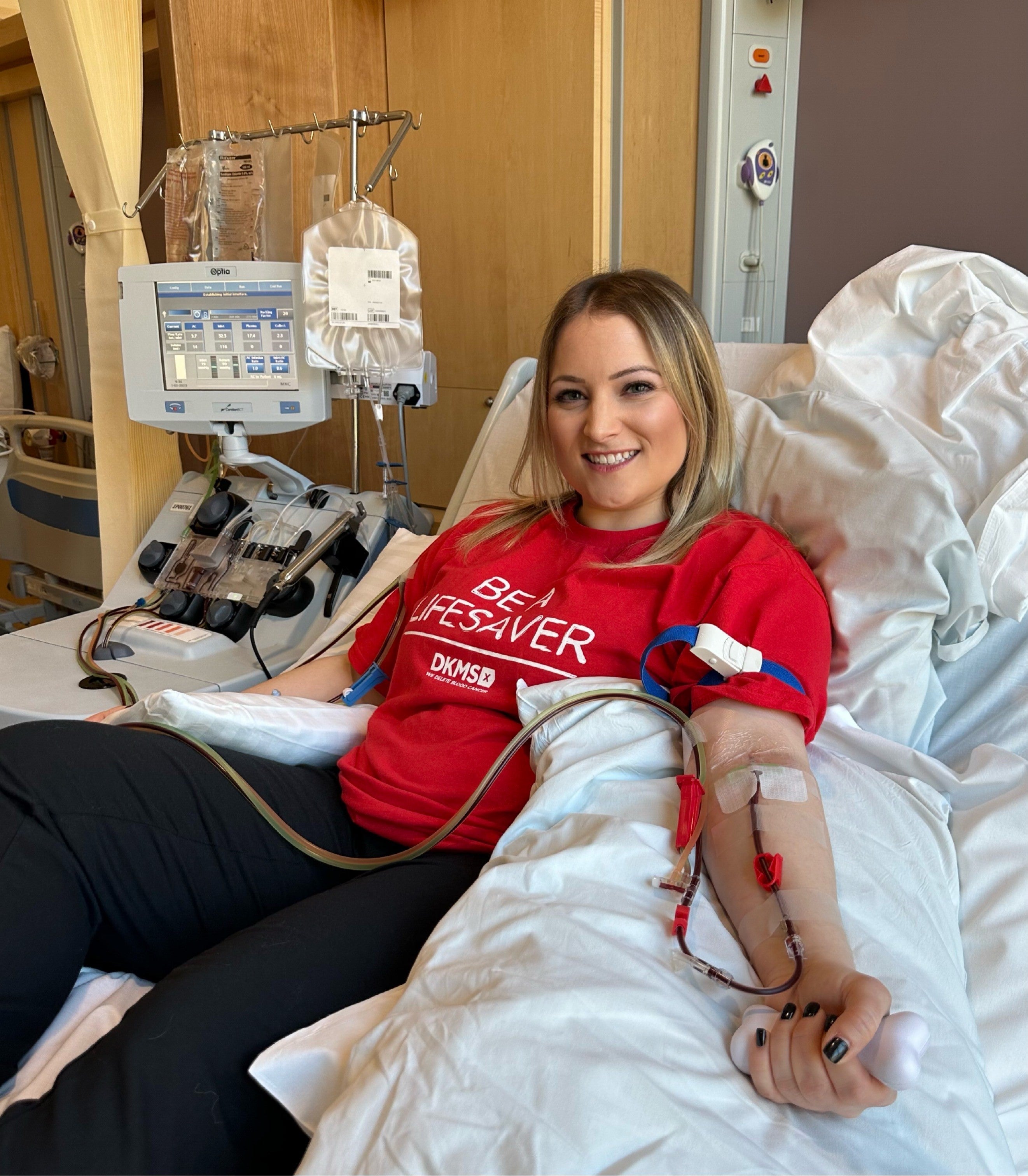 Gemma Cuff lying on hospitl bed giving her donation