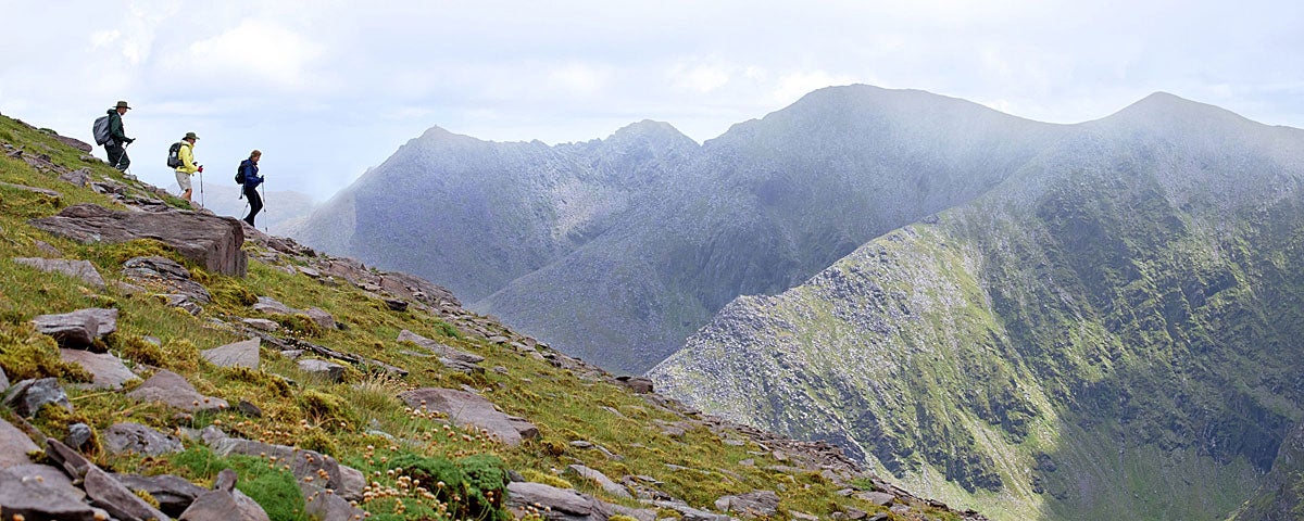 Wilderness Ireland view of hikers in the mountains