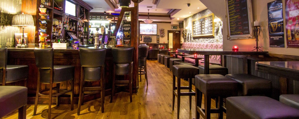 A view of the downstairs seating area and bar in Maxwell's Bar & Restaurant