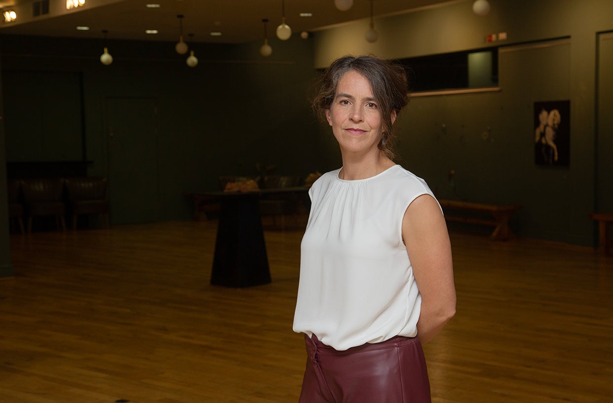 Laura Hyland in a large room.