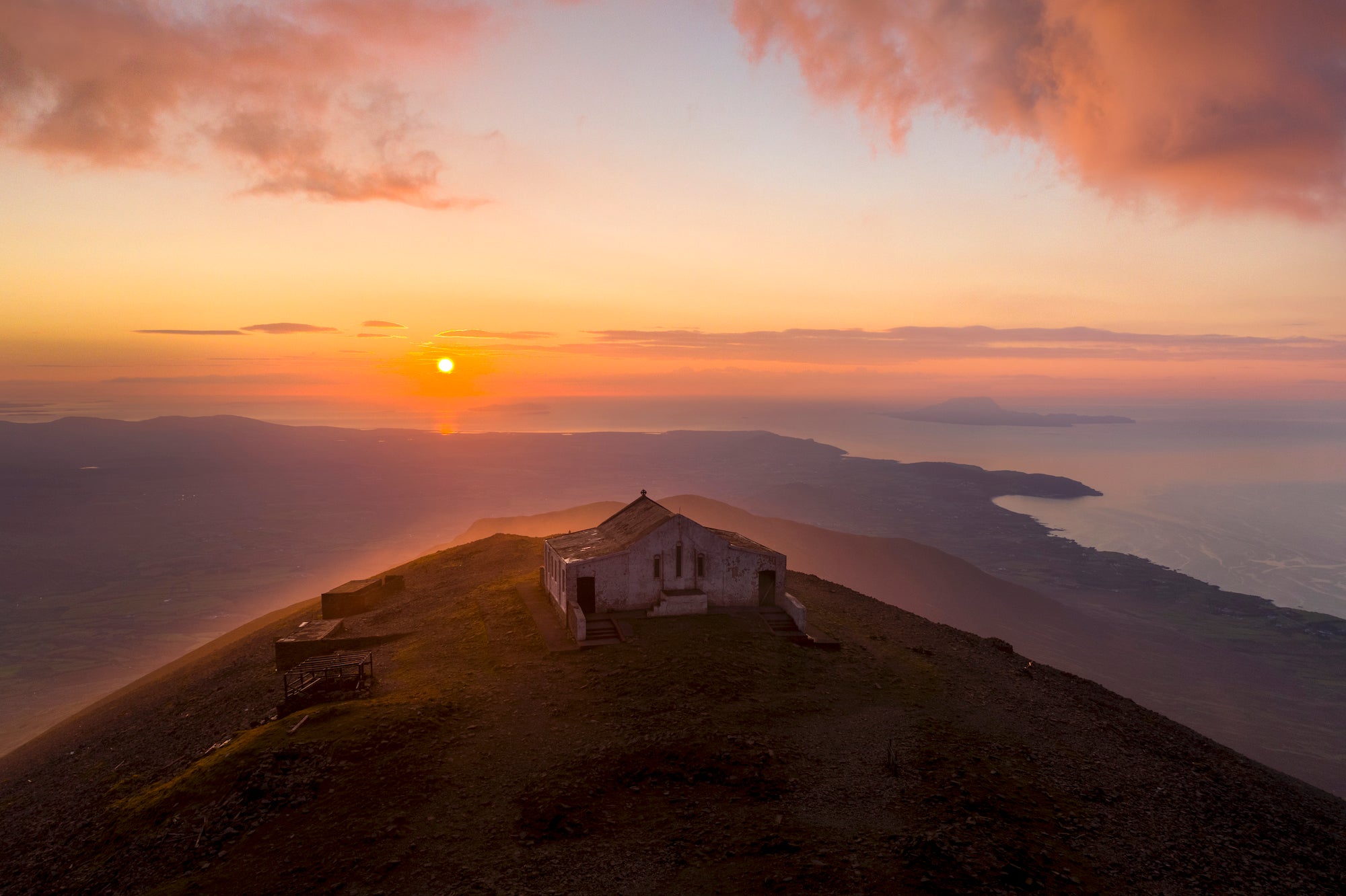 The summit of Croagh Patrick in Co Mayo at sunset