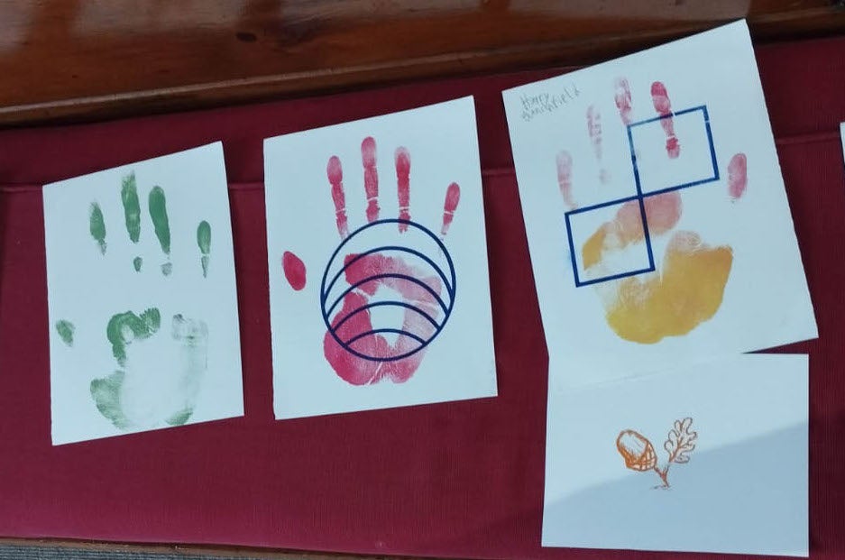 Earth Charter symbols with handprints