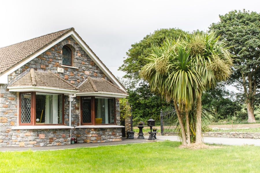 Front view of house with garden infront