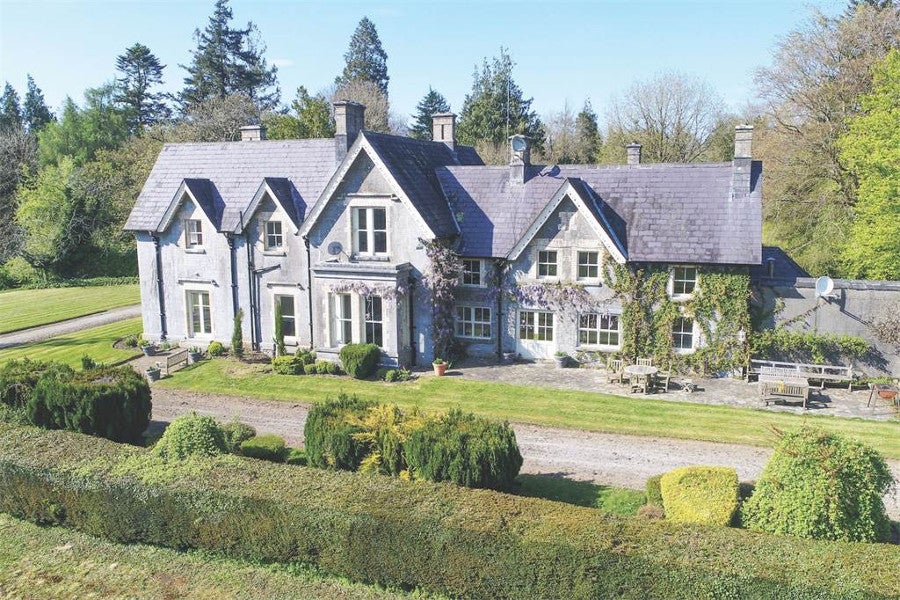 Front view of house and gardens