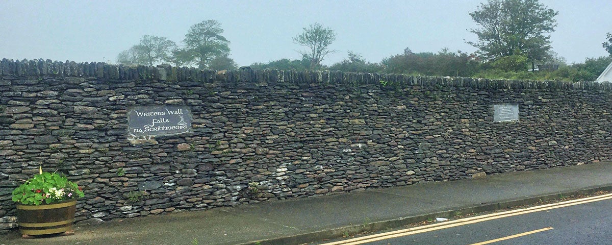 A view of the Writers Wall in Dingle showing two of the tribute plaques