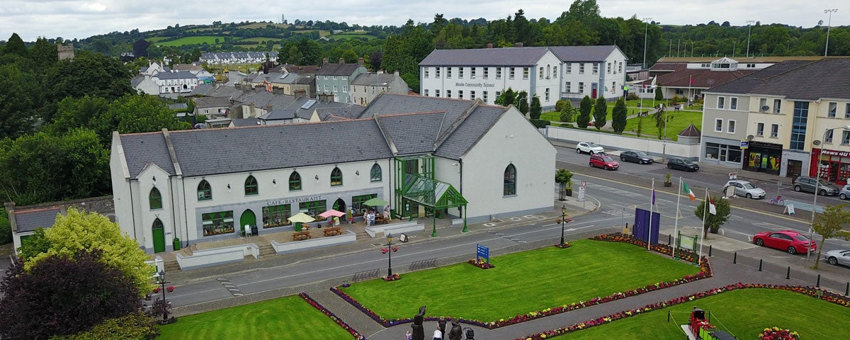 Aerial view of Tour Ard Theatre in front of the village green in Moate, County Westmeath