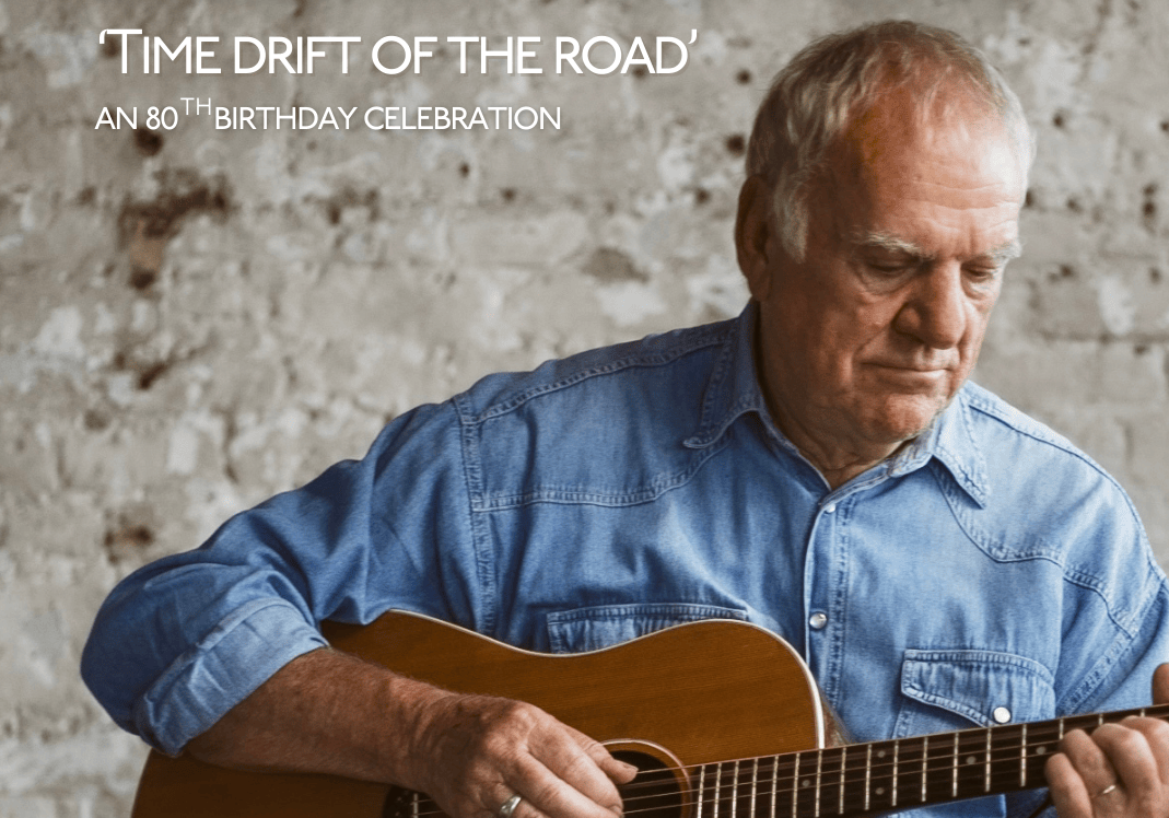 Ralph McTell Strumming his guitar.