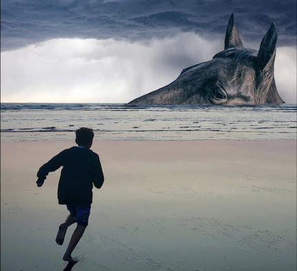 A silhouette of a child running away on a beach towards the shore where a giant horses head is visible in the breaking waves.