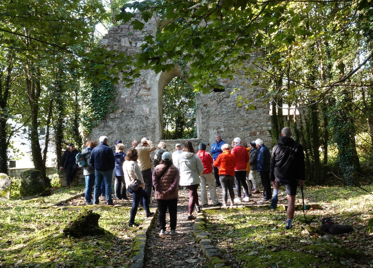A Clifden Historical Walking Tour group visiting Clifden Christ Church