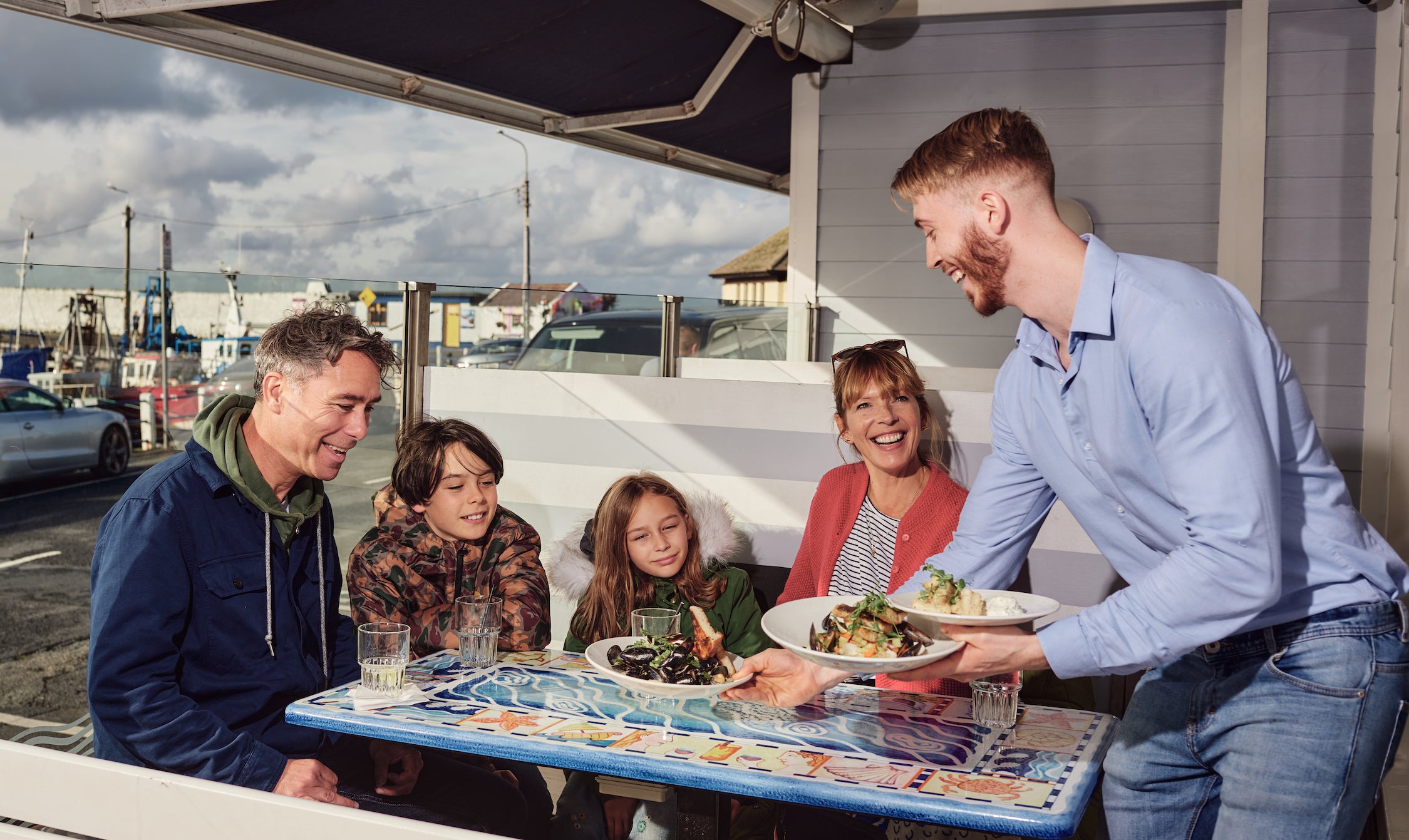 People being served food at the Blue Bar in Skerries, Co Dublin