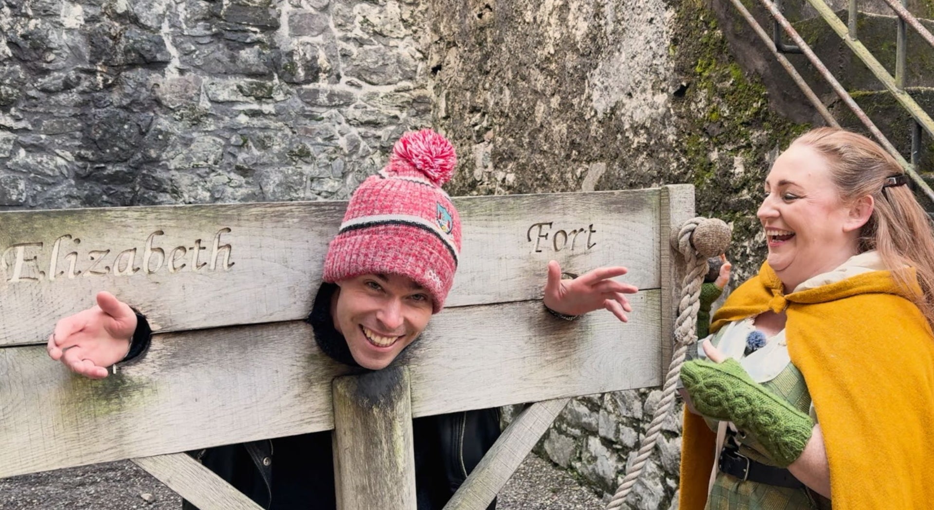 The tour guide and guest at the guillotine in Elizabeth Fort