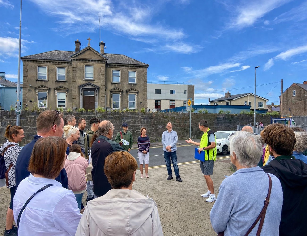 A group of people listening to their guide with Treaty Walking Tours