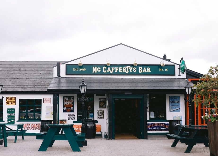 McCafferty's Bar, Lettermacaward. Front view of single storey building in white with dark green