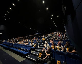 A crowd of people in a cinema