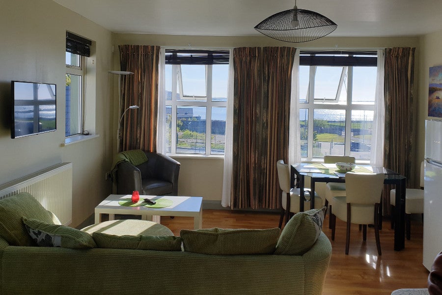 Seating area with couch and table and chair