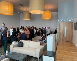 A group of people in a lounge area